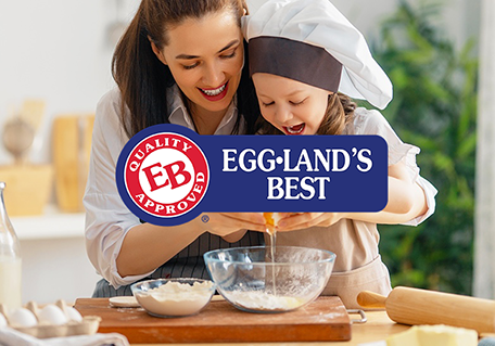 Egg Land's Best Mom and Child cooking with eggs